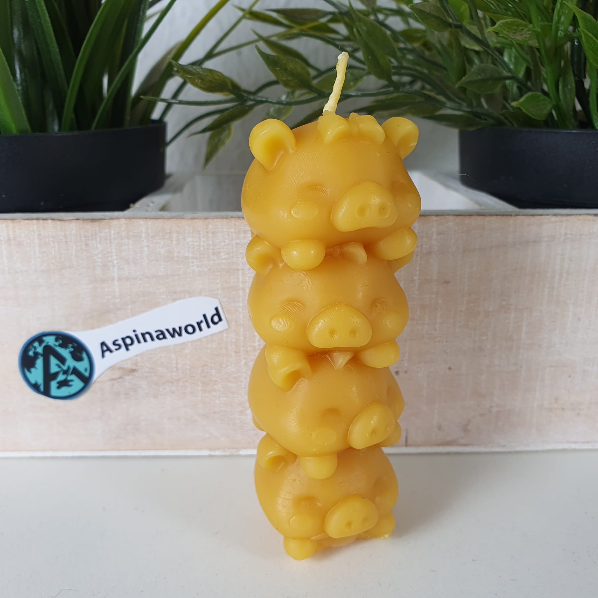 Bienenwachskerze vier Schweine aufeinander 9 cm